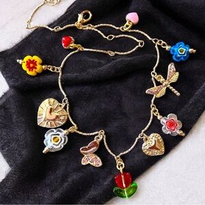 Gold and Red toned Charm Necklace glass rhinestones enamel tulip flower hearts